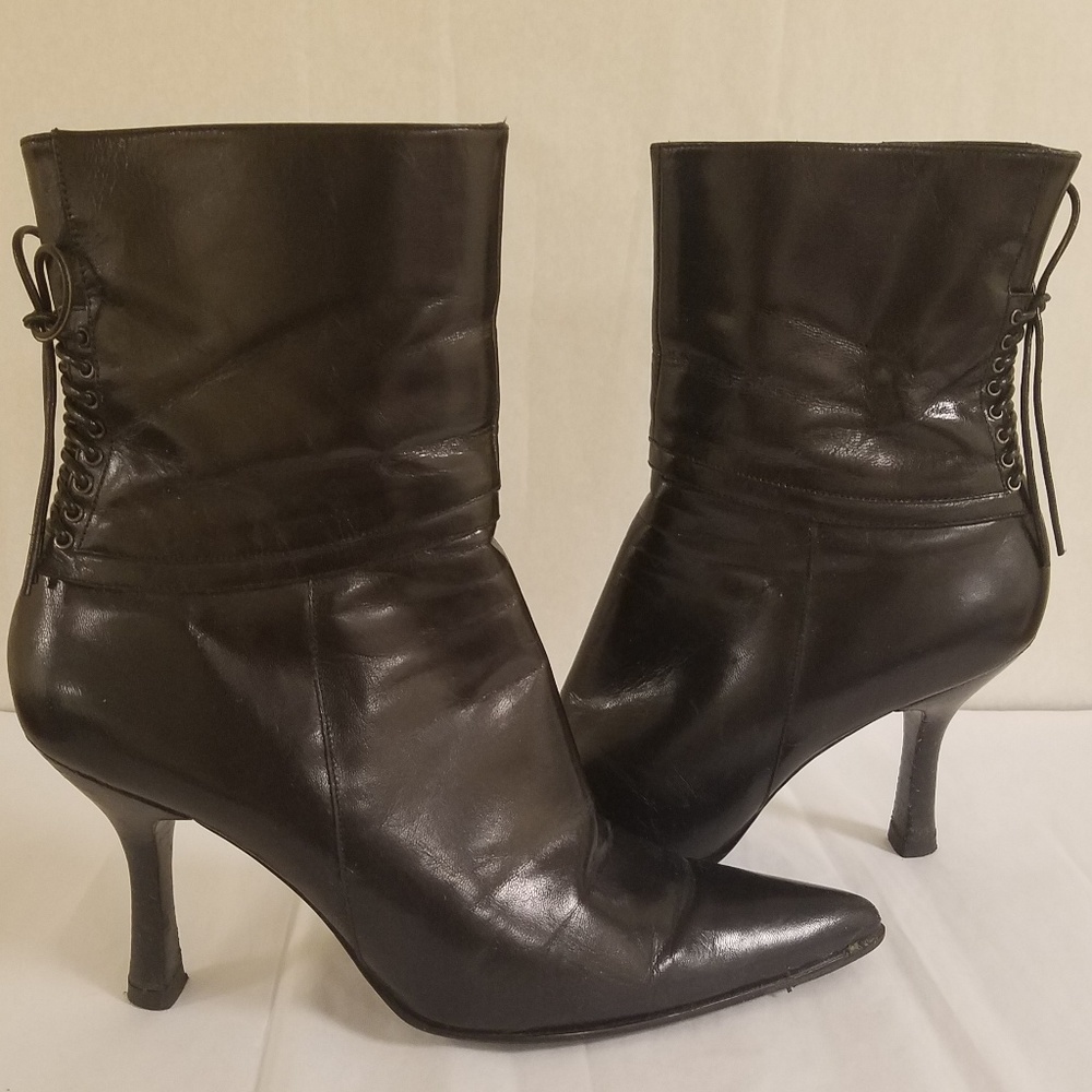 Black leather pointy toe boots
